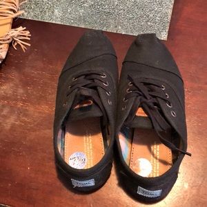 Black lace up Toms